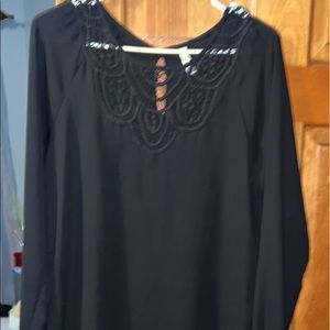 Black dressy blouse with embroidered neckline